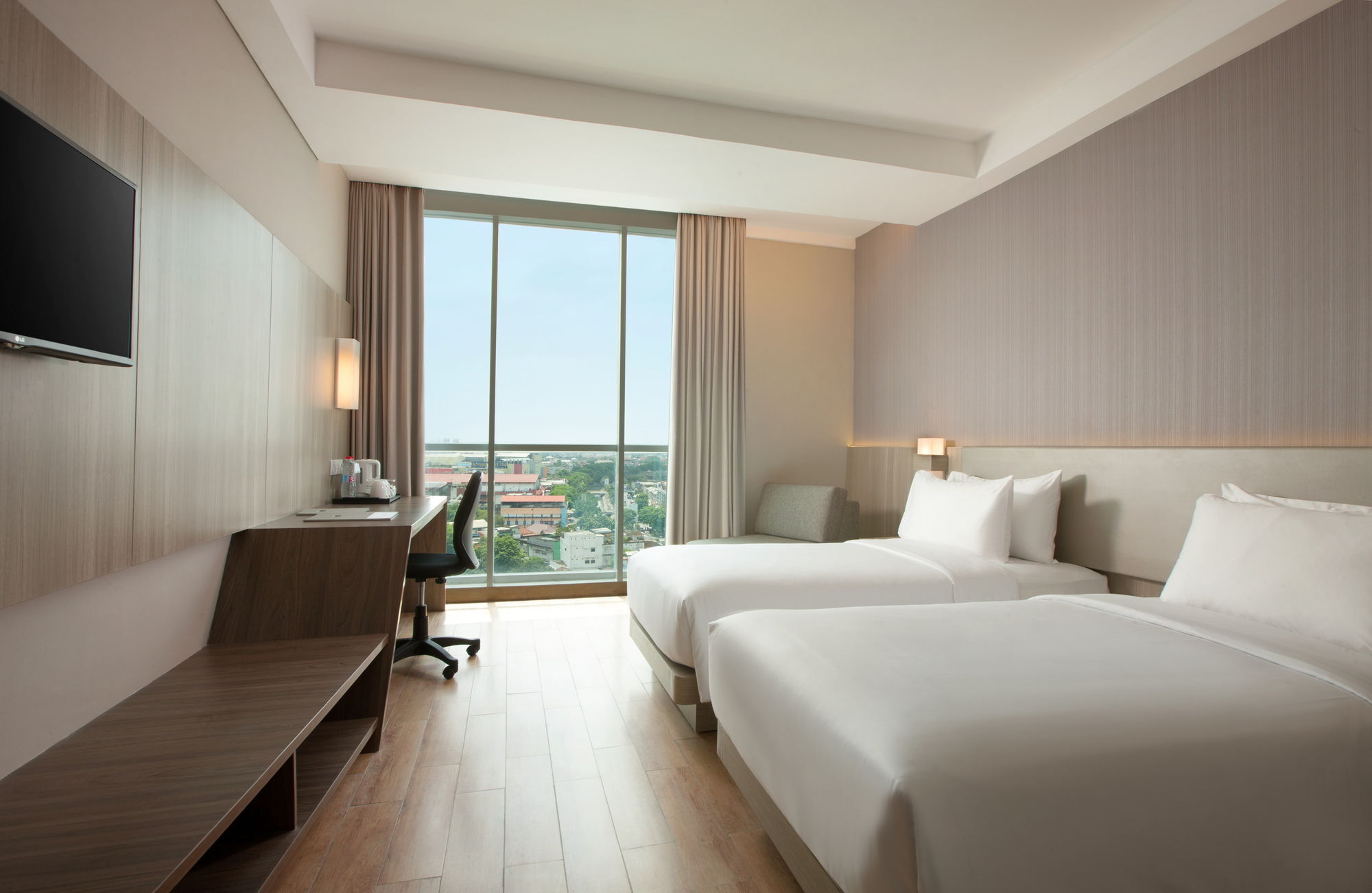 Hotel Santika Radial Палембанг Экстерьер фото